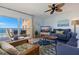 Living room with ocean view and comfortable seating at 18610 Gulf Blvd # 402, Indian Shores, FL 33785