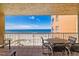 Balcony with ocean view and outdoor seating at 18610 Gulf Blvd # 402, Indian Shores, FL 33785