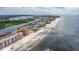 Aerial view showing beachfront condo and surrounding area at 18610 Gulf Blvd # 402, Indian Shores, FL 33785
