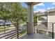 Private balcony overlooking tree-lined street and neighborhood homes at 2138 -1 W Beach St, Tampa, FL 33607