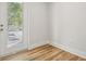 Room with hardwood floors and private balcony access at 2138 -1 W Beach St, Tampa, FL 33607