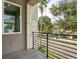 Private balcony overlooking tree-lined street at 2138 -1 W Beach St, Tampa, FL 33607