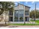 Modern two-unit building with gray and white exterior at 2138 -1 W Beach St, Tampa, FL 33607