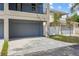 Modern two-car garage with ample parking space and a private driveway at 2138 -1 W Beach St, Tampa, FL 33607