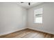 Well-lit bedroom featuring wood-look floors and a window at 2138 -1 W Beach St, Tampa, FL 33607
