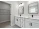 Bright bathroom boasts double vanity, quartz countertops, and walk-in shower at 2138 -1 W Beach St, Tampa, FL 33607