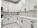 Modern kitchen with white cabinets, quartz countertops and stainless steel appliances at 2138 -1 W Beach St, Tampa, FL 33607