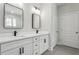 Modern bathroom with double vanity, quartz countertop, and walk-in shower at 2138 -1 W Beach St, Tampa, FL 33607