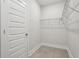 Spacious walk-in closet with wire shelving at 2138 -1 W Beach St, Tampa, FL 33607