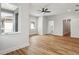 Bright bedroom featuring hardwood floors and an ensuite bathroom at 2138 -1 W Beach St, Tampa, FL 33607