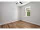 Bright bedroom with wood-look floors and a large window at 2138 -1 W Beach St, Tampa, FL 33607