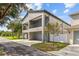 Two-story home with attached garage, private driveway, and balcony at 2138 -1 W Beach St, Tampa, FL 33607