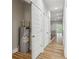 Hallway with water heater and additional storage at 2138 -1 W Beach St, Tampa, FL 33607