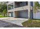 New construction home with attached two-car garage and private driveway at 2138 -1 W Beach St, Tampa, FL 33607