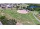 Community baseball field with bleachers at 1908 Sterling Glen Ct, Sun City Center, FL 33573