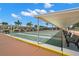 Community shuffleboard courts with covered seating at 1908 Sterling Glen Ct, Sun City Center, FL 33573