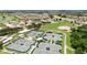 Community tennis courts and a surrounding neighborhood at 1908 Sterling Glen Ct, Sun City Center, FL 33573