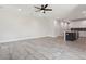 Spacious living room with tile flooring and ceiling fan at 2138 - 2 W Beach St, Tampa, FL 33607
