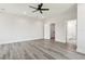 Bright bedroom with hardwood floors, ceiling fan and ensuite bathroom at 2138 - 2 W Beach St, Tampa, FL 33607