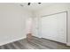 Spacious bedroom with gray vinyl flooring and a view of another room at 2138 - 2 W Beach St, Tampa, FL 33607