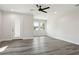 Spacious bedroom with hardwood floors, ceiling fan and private access to balcony at 2138 - 2 W Beach St, Tampa, FL 33607