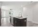 Modern kitchen island with a double sink and white countertop at 2138 - 2 W Beach St, Tampa, FL 33607