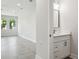 Modern bathroom with white vanity and a sleek rectangular mirror at 2138 - 2 W Beach St, Tampa, FL 33607