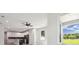 Open concept kitchen with white cabinets and a view of the backyard at 2138 - 2 W Beach St, Tampa, FL 33607
