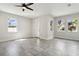 Spacious living area with tile floors and a ceiling fan at 2138 - 2 W Beach St, Tampa, FL 33607