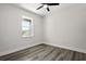 Bright bedroom with wood-look floors and ceiling fan at 2138 - 2 W Beach St, Tampa, FL 33607