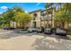 Condo building exterior with parking and landscaping at 17104 Carrington Park Dr # 520, Tampa, FL 33647