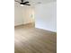 Spacious living room with light wood laminate flooring at 3407 E 10Th Ave, Tampa, FL 33605