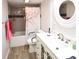 Updated bathroom with a tub shower combo and modern vanity at 7519 Harbor View Way, Seminole, FL 33776