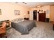 Bright bedroom with a dresser and wall-to-wall carpet at 7519 Harbor View Way, Seminole, FL 33776