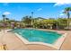Resort-style pool with comfortable lounge chairs at 17104 Carrington Park Dr # 520, Tampa, FL 33647