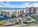 Aerial view of waterfront community with parking and building at 5220 Brittany Dr S # 106, St Petersburg, FL 33715