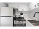 Updated kitchen featuring stainless steel range and sink at 4001 58Th N St # 28, St Petersburg, FL 33709