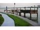 Community dock with seating area at 315 Medallion Blvd # H, Madeira Beach, FL 33708