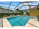 Inviting screened-in pool with a spacious deck at 3515 Springville Dr, Valrico, FL 33596