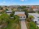 Aerial view showcasing the house and surrounding neighborhood at 1118 2Nd S Ave, Tierra Verde, FL 33715
