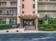 Building entrance featuring prominent signage, well-maintained landscaping, and easy access at 51 Island Way # 1107, Clearwater Beach, FL 33767