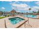 Community pool and hot tub with views of the boat docks and waterway for added relaxation at 51 Island Way # 1107, Clearwater Beach, FL 33767