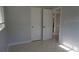 Neutral bedroom with tiled floor and closet offers a calm and organized space at 5805 Oxford Dr, Tampa, FL 33615