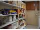 Organized pantry shelving providing ample storage space for food and household items at 5805 Oxford Dr, Tampa, FL 33615