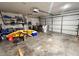 Attached garage with ample space for storage and vehicles at 2321 Rothenfeld Ct, Land O Lakes, FL 34639