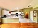 Kitchen with stainless steel appliances and breakfast bar at 2321 Rothenfeld Ct, Land O Lakes, FL 34639