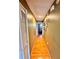 Bright hallway with wood flooring leading to bedrooms at 2321 Rothenfeld Ct, Land O Lakes, FL 34639