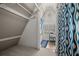 Small bathroom with shower and window at 4530 Flounder Dr, Hernando Beach, FL 34607