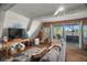 Living room with water views, hardwood floors, and comfortable seating at 4530 Flounder Dr, Hernando Beach, FL 34607