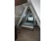 Upstairs bedroom with sloped ceilings and window at 4530 Flounder Dr, Hernando Beach, FL 34607